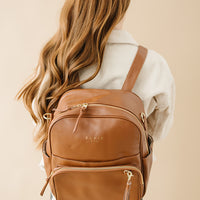Ekie Co Saddle Aspen Midi being worn as a backpack