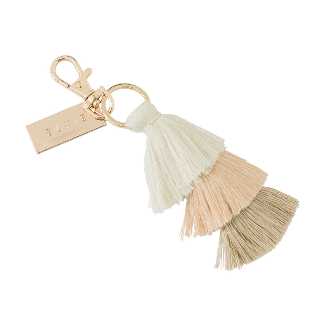 elkie sand tassl bag charm. colors are cream, beige, and tan