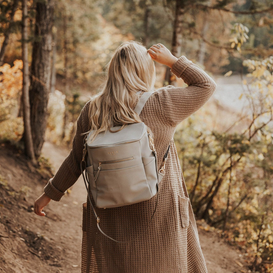 elkie Stone capri backpack being worn on girl in the woods
